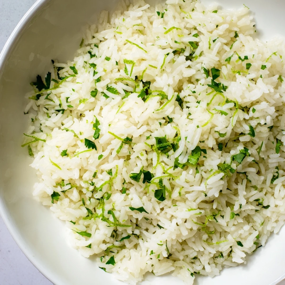 Fluffy cilantro lime rice, infused with citrus and cilantro, ready to be served.