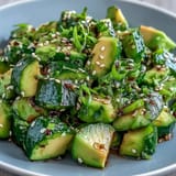 Fresh Smashed Cucumber and Avocado Salad with Sesame, a cool, crunchy side.