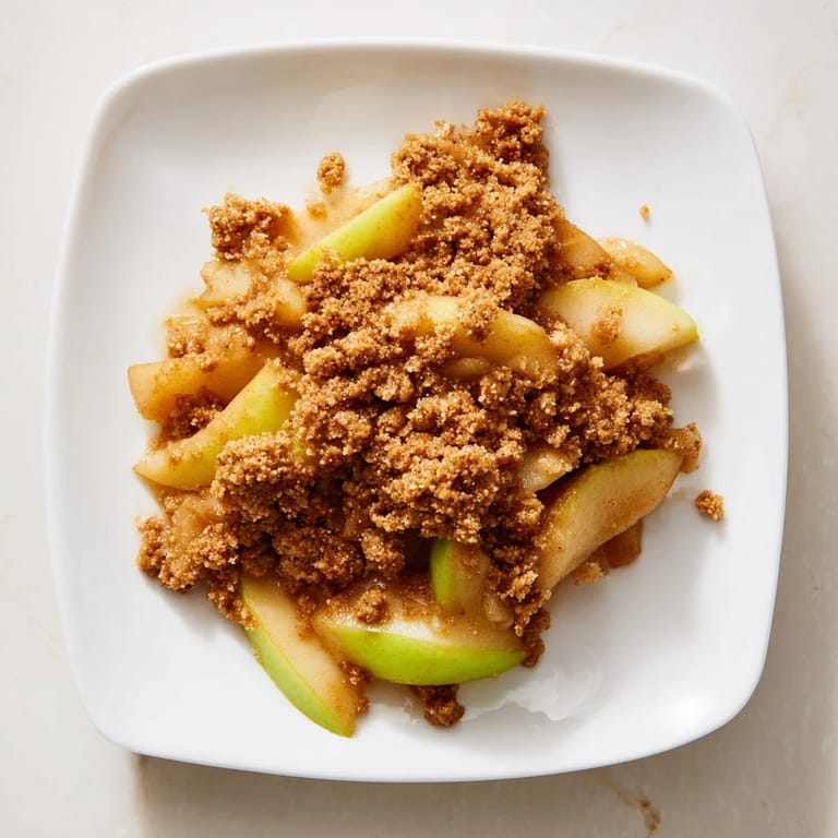 A freshly baked Rustic Apple and Cinnamon Crumb Bake, with a buttery, crisp crumb topping, delicious.
