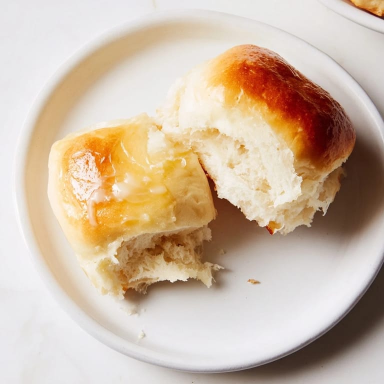 Soft, pillowy Quick-Rise Dinner Rolls; imagine biting into a fresh, homemade, comforting bread.