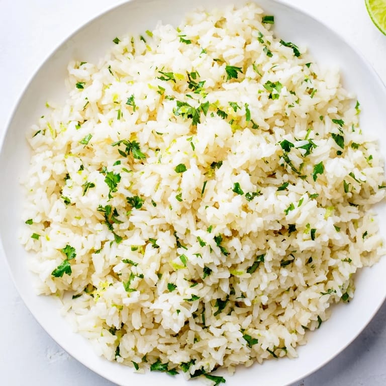 Fluffy white rice tossed with lime zest and fresh cilantro makes this cilantro lime rice.
