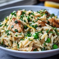 Creamy One-Pot Lemon Orzo with Chicken and Peas, a bright Mediterranean dinner in a single skillet.  